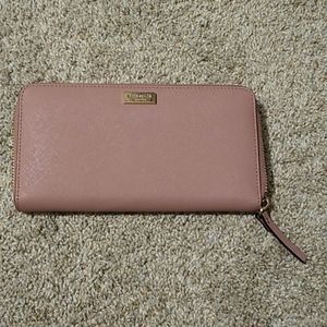 Kate Spade large, pink (mauve is more accurate), zip wallet.